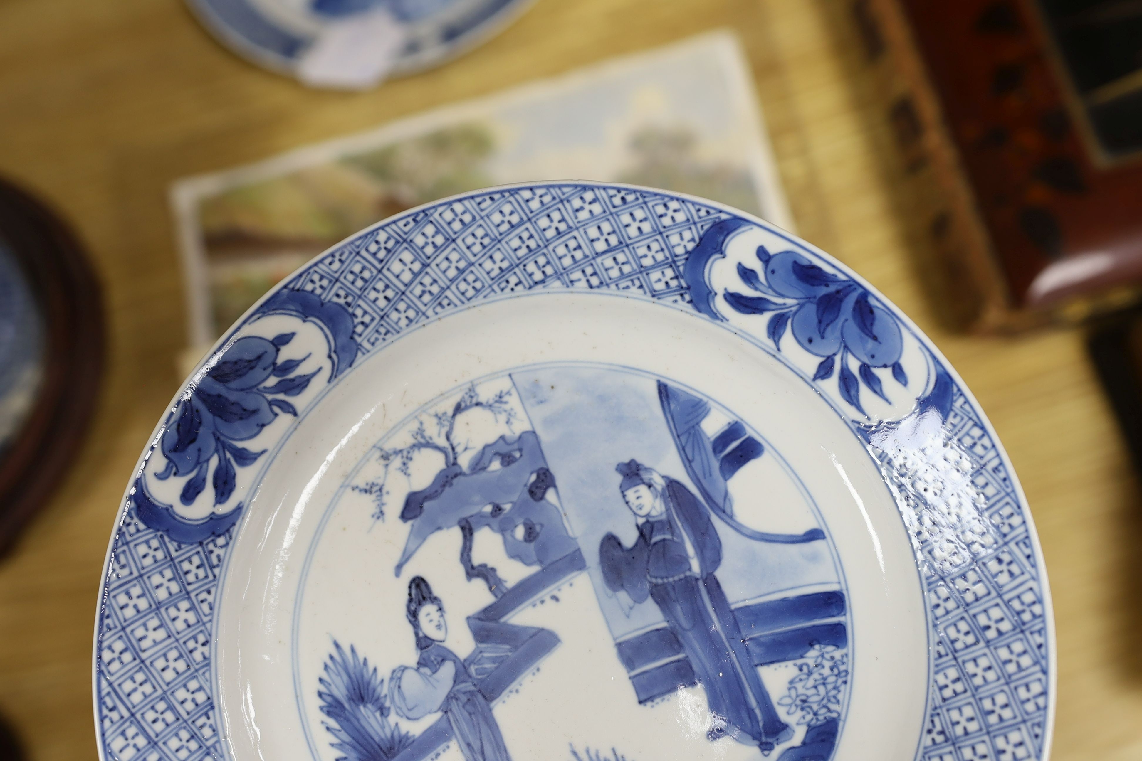 Two Chinese blue and white plates, Kangxi period, one with Kangxi mark the other a Chenghua mark, 21 cms diameter